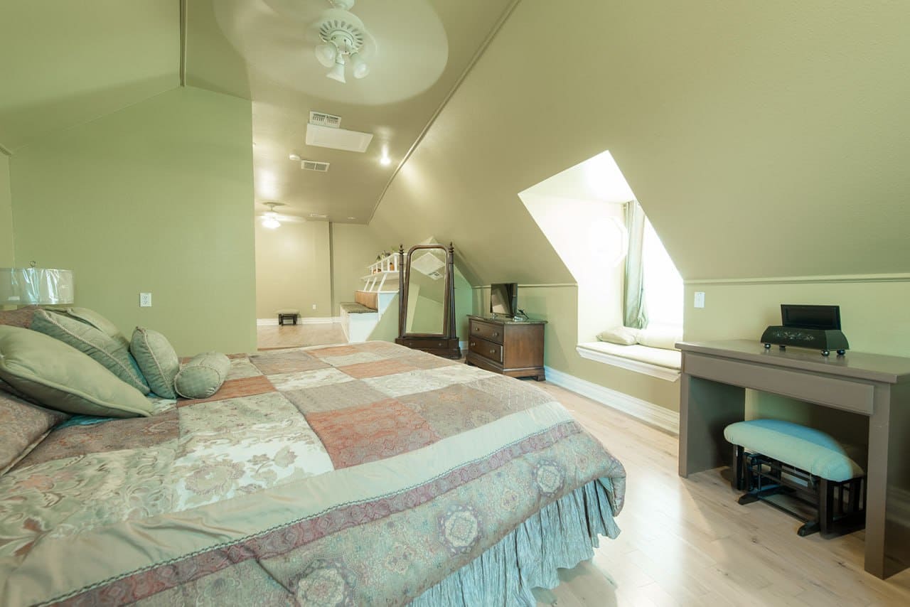 Bedroom suite at Settles Point with built-in window seat and desk